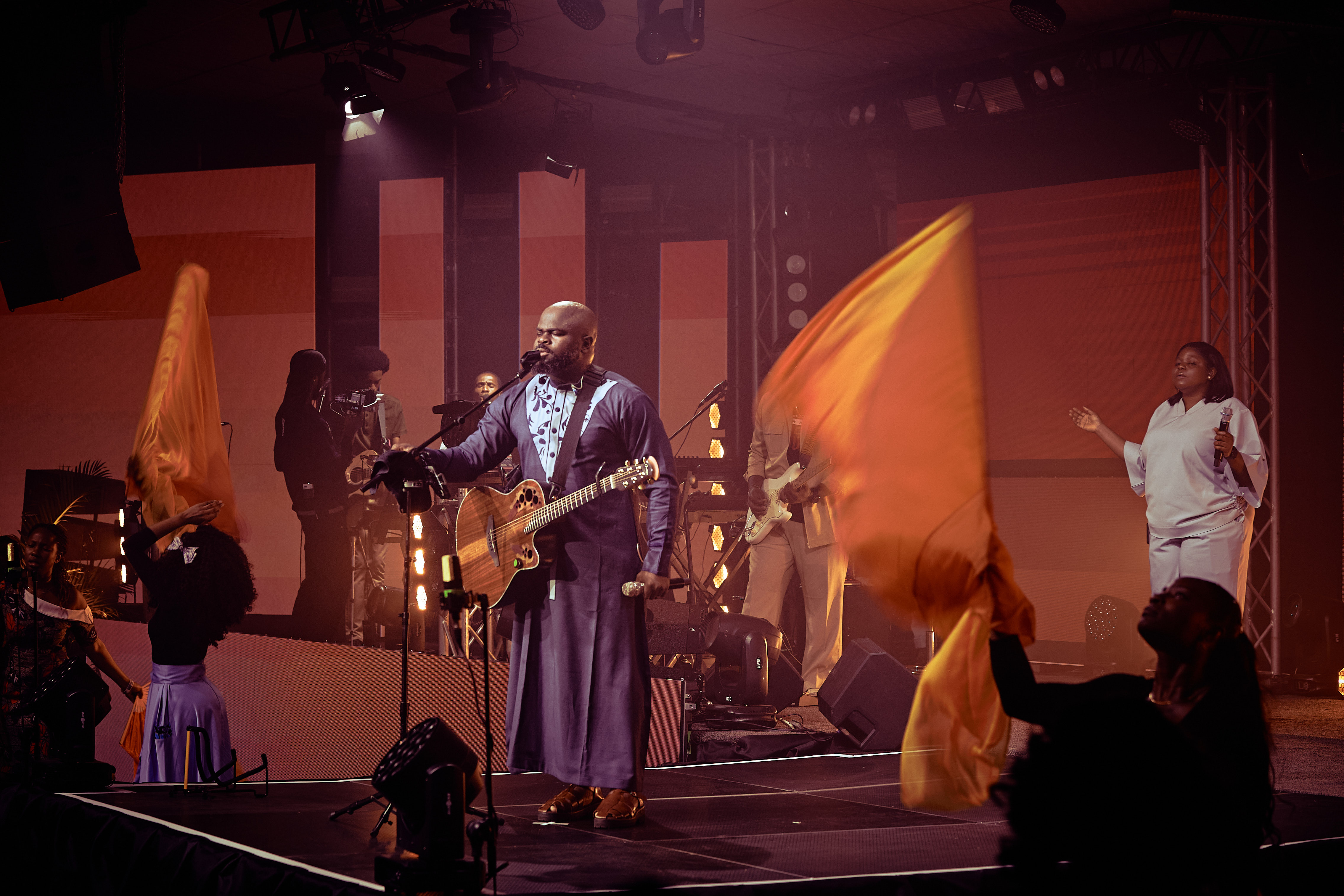 Moses singing with guitar